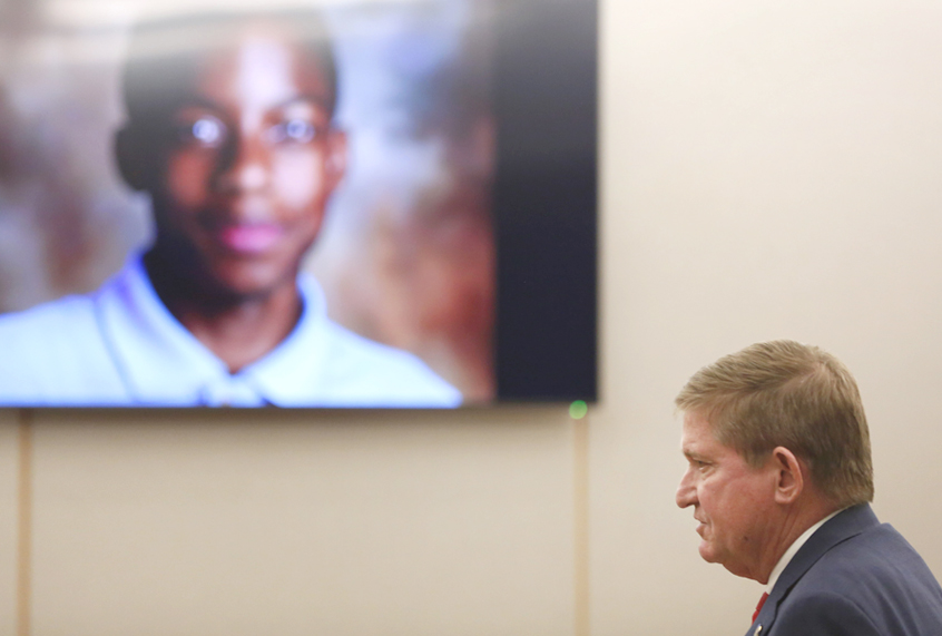 Jordan Edwards is shown on a screen as lead prosecutor Michael Snipes gives a closing argument during the eighth day of the trial of fired Balch Springs police officer Roy Oliver, who is charged with the murder of 15-year-old Jordan Edwards on Monday, Aug. 27, 2018. (Rose Baca/The Dallas Morning News via AP)