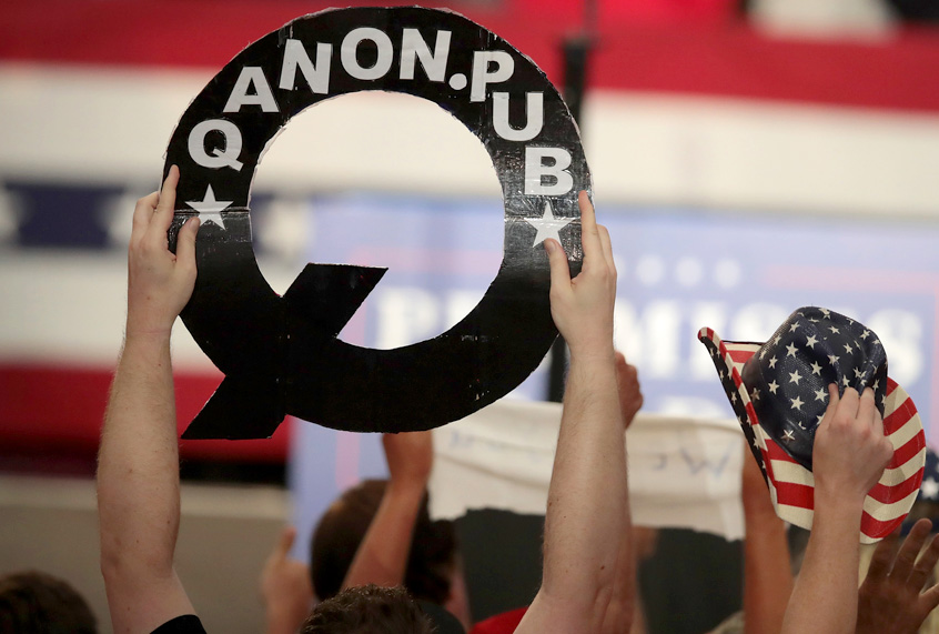 Supporters cheer for Donald Trump as he speaks at a rally. (Getty/Scott Olson)