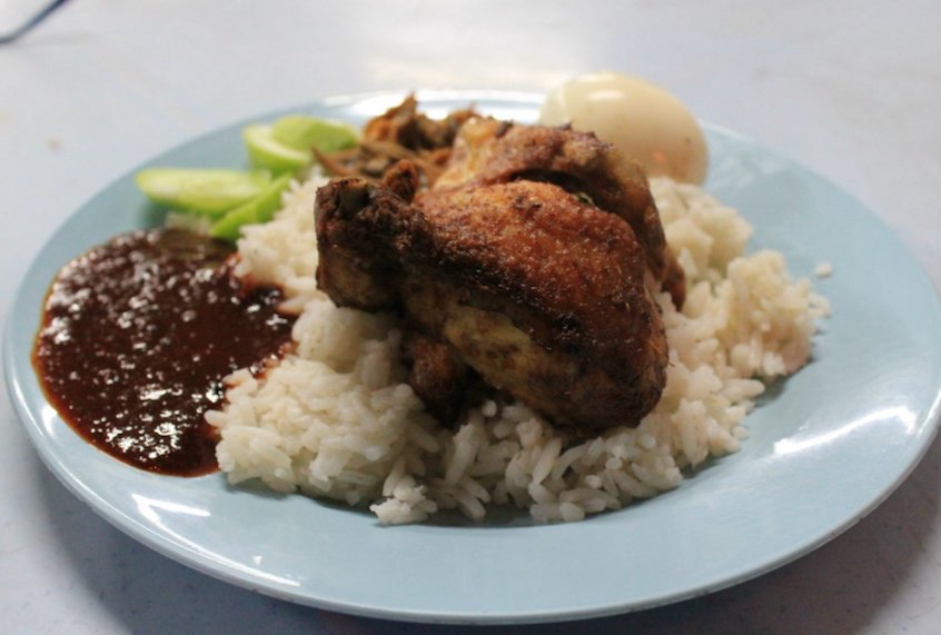 Nasi Lemak, a traditional Malaysian breakfast, is a must-try when visiting Kuala Lumpur. (Jamie Barys / Fathom)