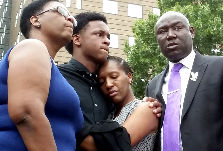 Botham Jean's family, Allison Jean, Brandt Jean, and Allisa Charles-Findley are joined by attorney Benjamin Crump during a news conference, Sept. 10, 2018. (AP/Ryan Tarinelli)