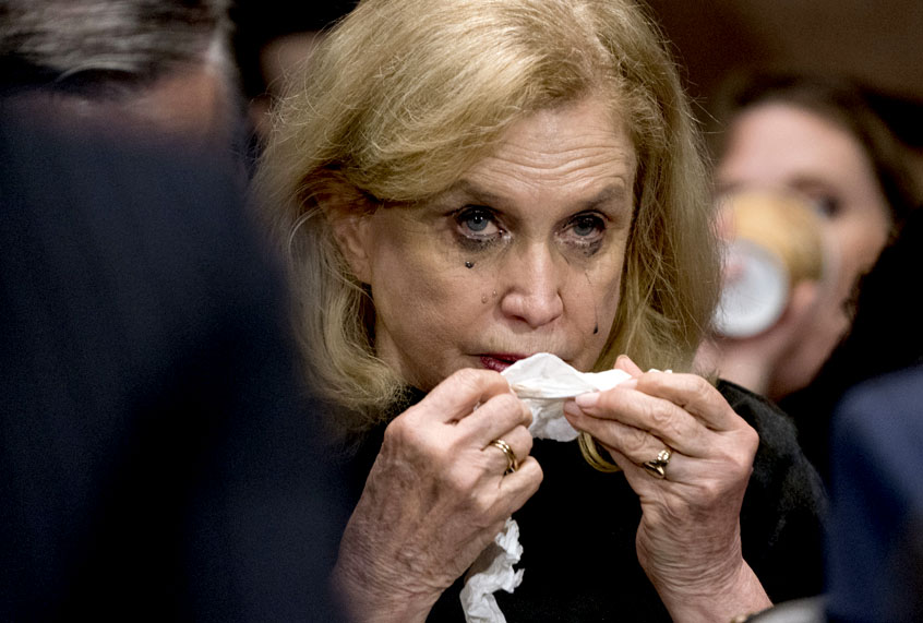Rep. Carolyn Maloney, D-N.Y., becomes emotional while listening to Christine Blasey Ford testify before the Senate Judiciary Committee on Capitol Hill in Washington, Thursday, Sept. 27, 2018. (AP/Andrew Harnik)