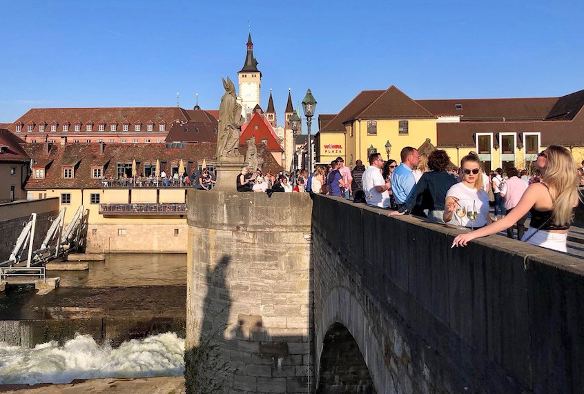 As the sun goes down, Würzburgers flock to the Old Main Bridge for a happy hour drink. (Photo by Paul Jebara / Fathom)