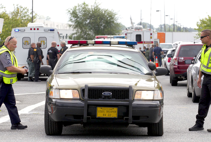 Aberdeen police officers block the entrance of industrial complex where several people had been shot, in Harford County, Md, Thursday, Sept. 20, 2018. (AP/Jose Luis Magana)