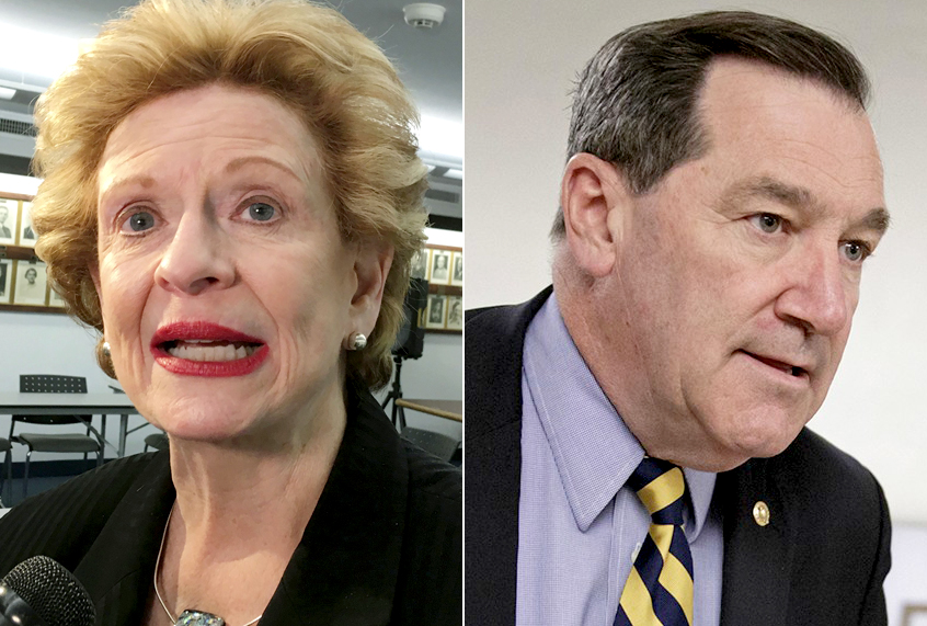 Debbie Stabenow;  Joe Donnelly (AP/David Eggert/J. Scott Applewhite)