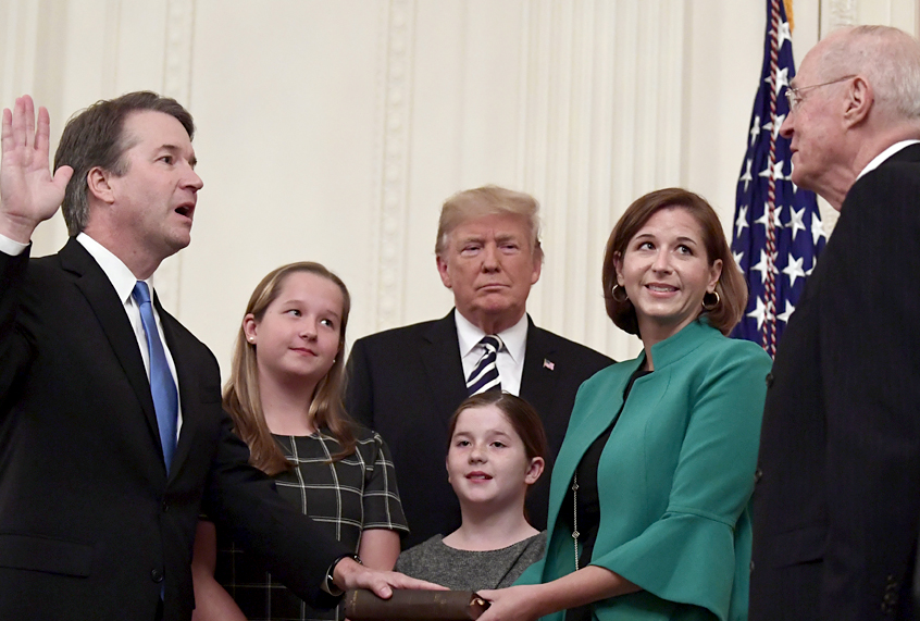 Retired Supreme Court Justice Anthony Kennedy ceremonially swears-in Supreme Court Justice Brett Kavanaugh in the East Room of the White House, Oct. 8, 2018. (AP/Susan Walsh)