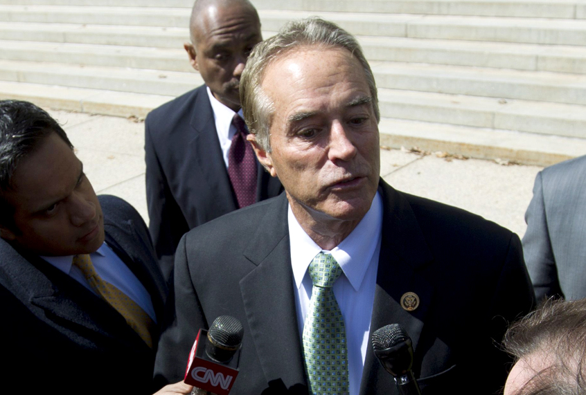 Rep. Chris Collins speaks with reporters as he leaves a closed-door meeting with then presidential candidate Donald Trump in 2016. (AP/Jose Luis Magana)