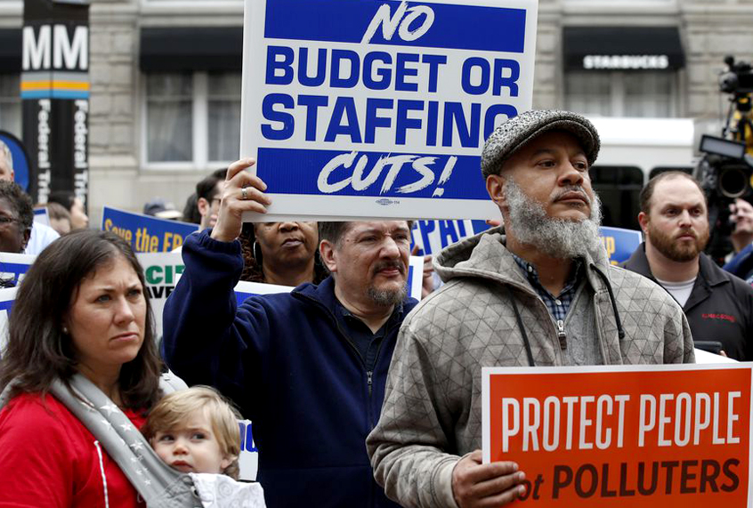 Protesters listen to speakers talk about EPA Administrator Scott Pruitt and the state of the EPA during a protest by the American Federation of Government Employees union, Wednesday, April 25, 2018, in Washington. (AP/Alex Brandon)