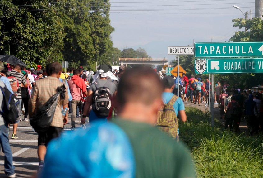 Central American migrants walk north toward Tapachula, after departing Ciudad Hidalgo, Mexico, Sunday, Oct. 21, 2018. (AP/Moises Castillo)