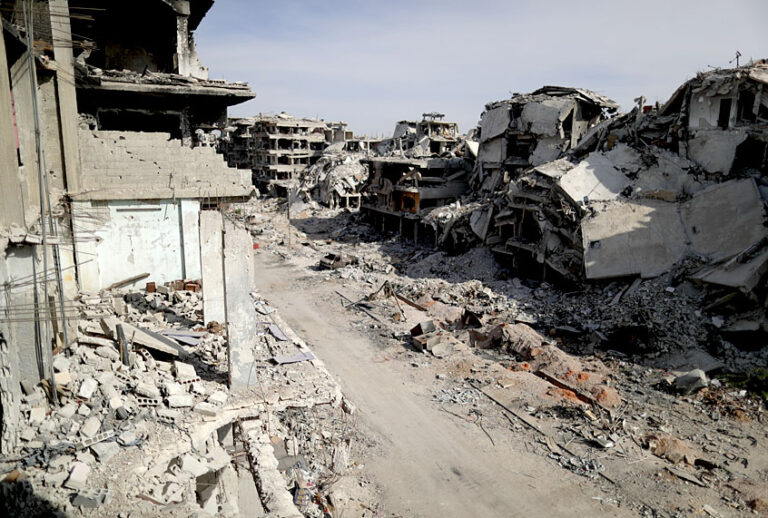 Buildings lie in ruins in the Palestinian refugee camp of Yarmouk in the Syrian capital Damascus, Syria, Oct. 6, 2018.  The camp has been gutted by years of war. (AP/Hassan Ammar)