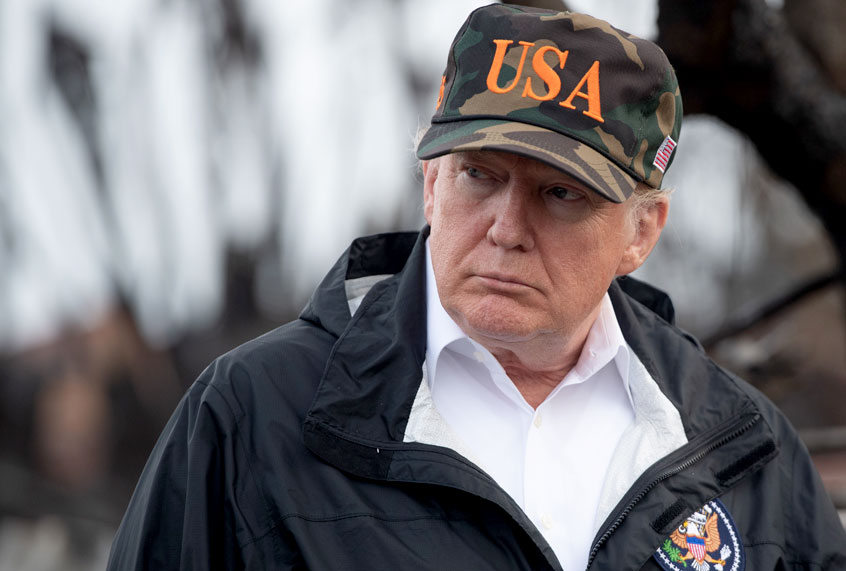 Donald Trump views damage from wildfires in Malibu, California, on November 17, 2018 (Getty/Saul Loeb)