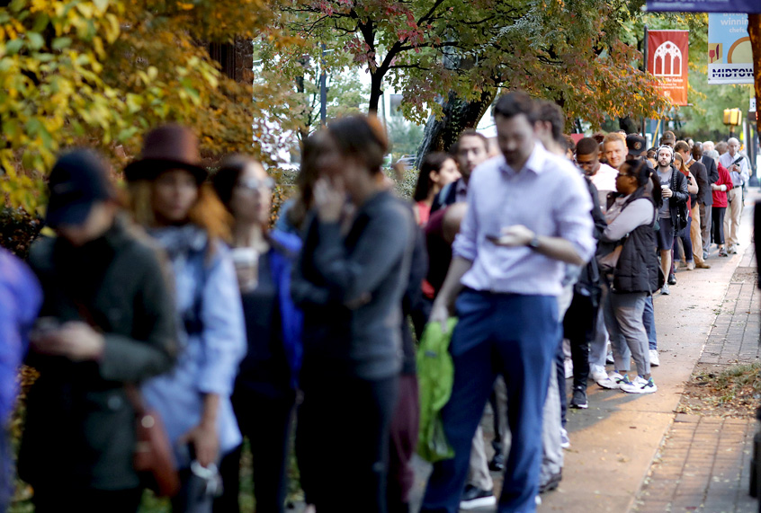 A line forms outside a polling site on election day in Atlanta, Tuesday, Nov. 6, 2018. (AP/David Goldman)
