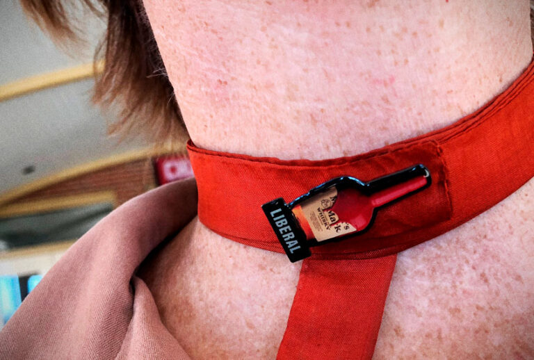Deanna Tracy of Anderson County, Kentucky, sports a Maker's Mark bourbon "liberal" pin on election day. (Erin Keane)