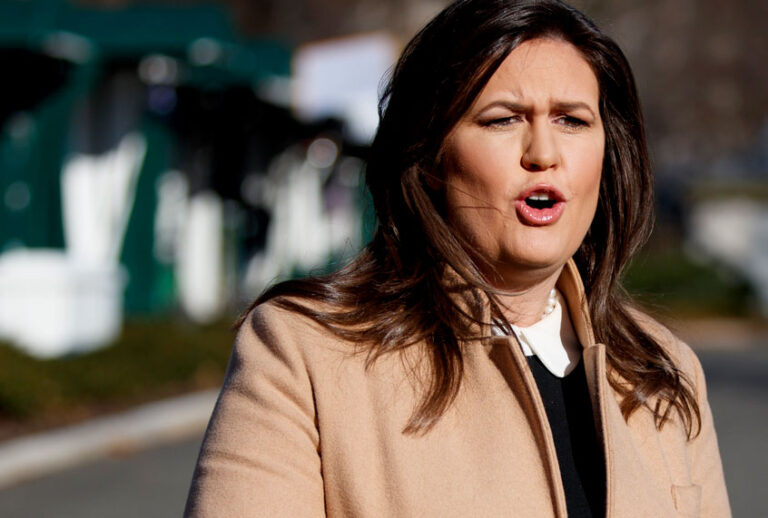 White House press secretary Sarah Huckabee Sanders talks with reporters outside the White House, Tuesday, Dec. 18, 2018. (AP/Evan Vucci)