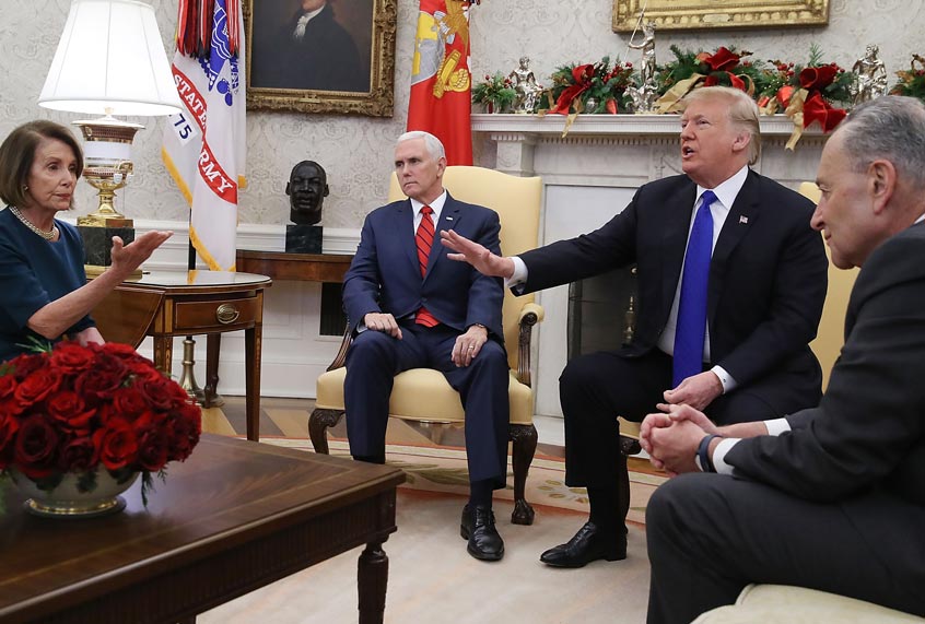 Donald Trump argues about border security with Senate Minority Leader Chuck Schumer and House Minority Leader Nancy Pelosi as Vice President Mike Pence sits nearby in the Oval Office on December 11, 2018 in Washington, DC. (Getty/Mark Wilson)