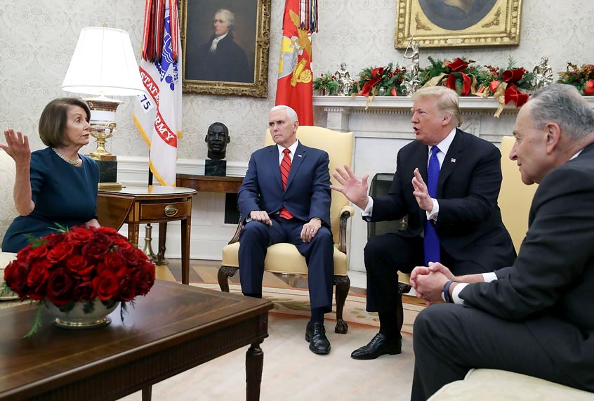 Donald Trump argues about border security with Senate Minority Leader Chuck Schumer and House Minority Leader Nancy Pelosi as Vice President Mike Pence sits nearby in the Oval Office on December 11, 2018 in Washington, DC. (Getty/Mark Wilson)