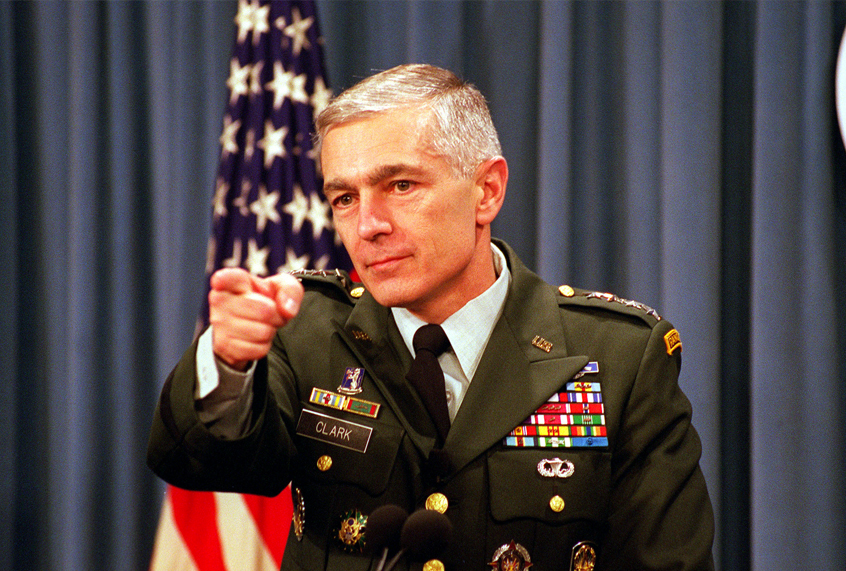 Supreme Allied Commander Europe U.S. Army Gen. Wesley Clark, who also commands U.S. European Command, takes reporters' questions on the status of the NATO-led, international peacekeeping operation in Bosnia during a Pentagon briefing. DoD photo by R.D. Ward. (Department of Defense (CC))
