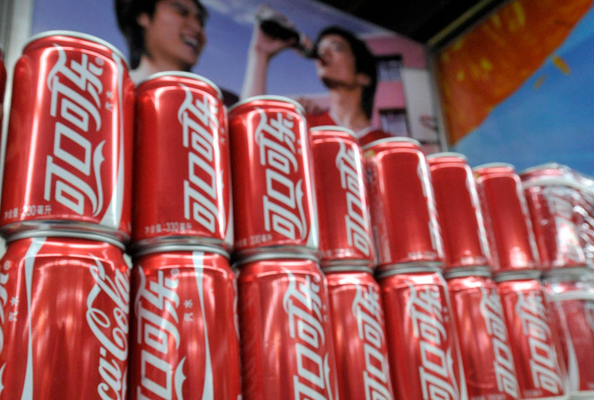 Bottles of Coca-Cola are displayed on the shelves of a store in Beijing. (Getty/Emilie Mocellin)
