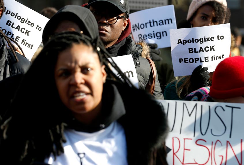 Demonstrators hold signs and chant outside the Governors Mansion at the Capitol in Richmond, Va., Saturday, Feb. 2, 2019. (AP/Steve Helber)