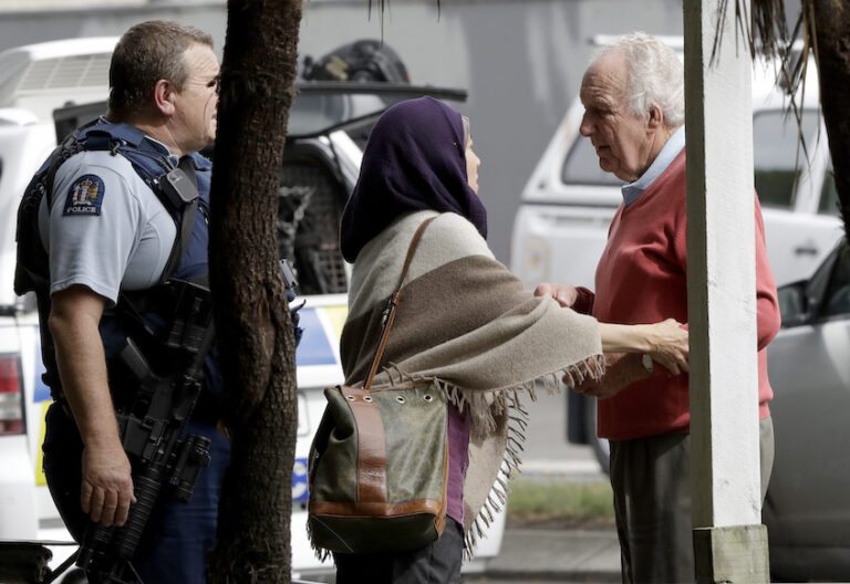 Police escort people away from outside a mosque in central Christchurch, New Zealand, Friday, March 15, 2019. (AP Photo / Mark Baker)