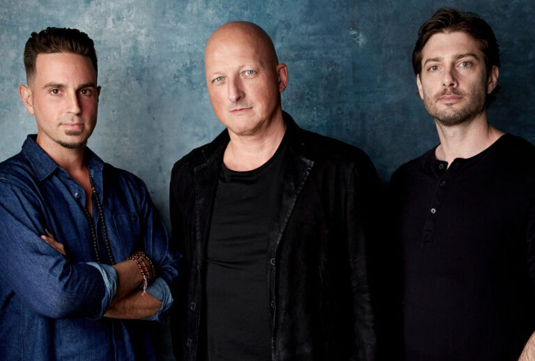 Wade Robson, from left, director Dan Reed and James Safechuck pose for a portrait to promote the film "Leaving Neverland" at the Salesforce Music Lodge during the Sundance Film Festival in Park City, Utah. (AP/Taylor Jewell)