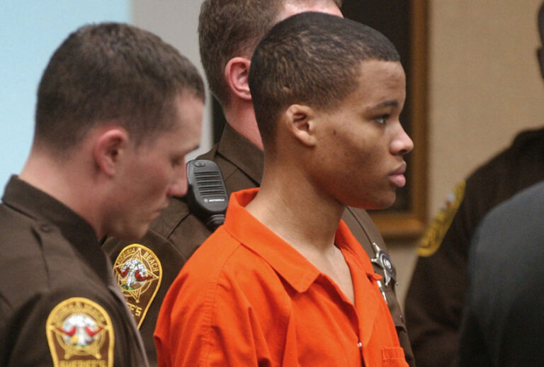 Lee Boyd Malvo listens to court proceedings during the trial of fellow sniper suspect John Allen Muhammad in Virginia Beach, Va., Oct. 20, 2003. (AP/Martin Smith-Rodden)