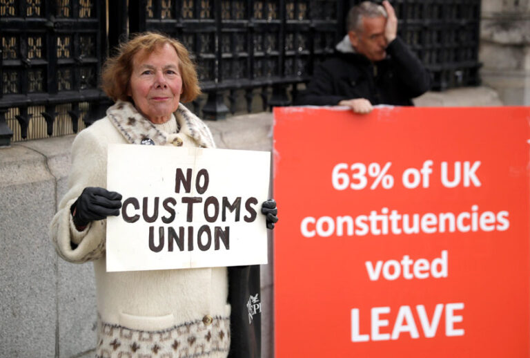Pro-Brexit supporters protest outside the Houses of Parliament in London, Monday, March 18, 2019. (AP/Matt Dunham)