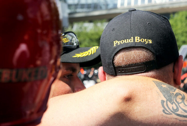 A person wears a hat of US far-right men's organisation Proud Boys. (Getty/Thomas Patterson)