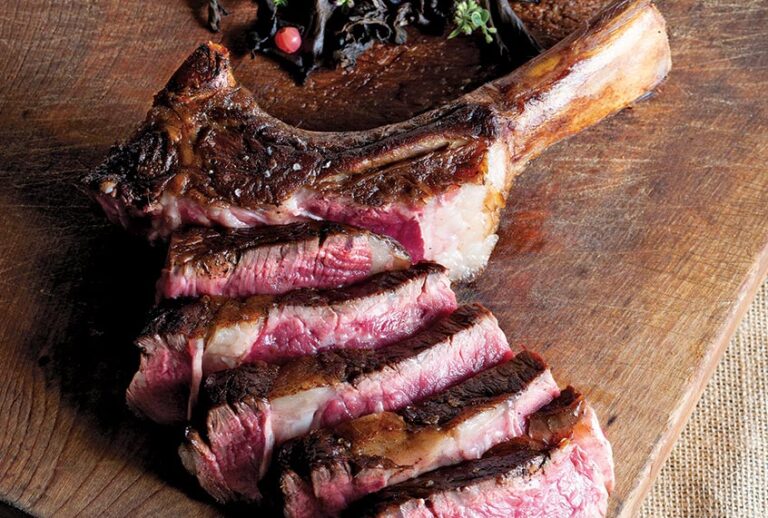 Tomahawk Rib Eye with Black Trumpets (c) (Erin Kornfeld and Erica Leone)
