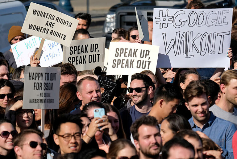Google employees hold up signs during a walkout rally at Harry Bridges Plaza, Thursday, Nov. 1, 2018, in San Francisco. (AP/Eric Risberg)