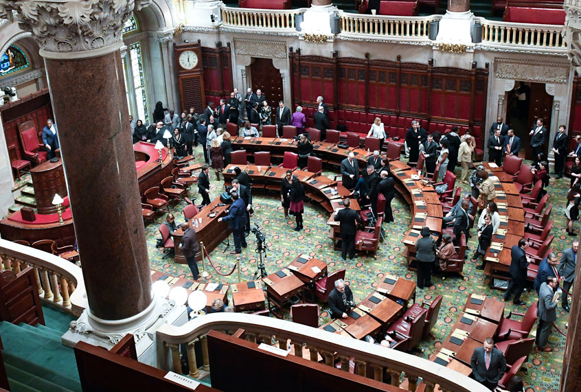 Senate members meet during opening day of the 2019 legislative session in the Senate Chamber at the Capitol on Wednesday, Jan. 9, 2019, in Albany, N.Y. (AP/Hans Pennink)