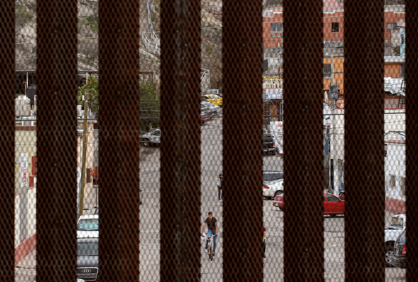 Nogales, Mexico, is framed by slats in a border wall that separates it from Nogales, Ariz., Saturday, March 2, 2019. (AP/Charlie Riedel)