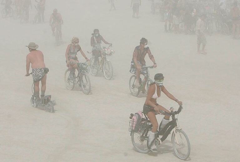 Burning Man festival participants endure a dust storm on the playa at the Black Rock Desert in Gerlach, Nev., on Thursday, Aug. 30, 2007. (AP/Brad Horn)