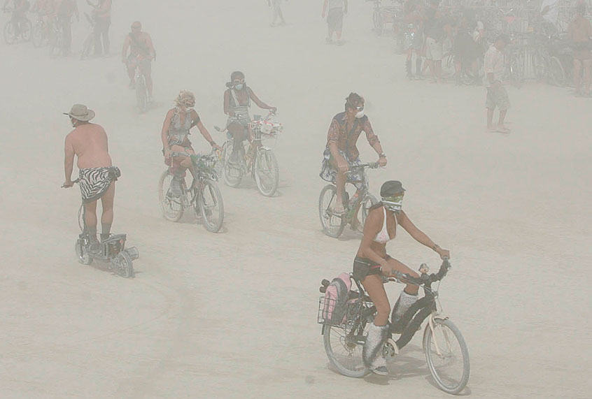Burning Man festival participants endure a dust storm on the playa at the Black Rock Desert in Gerlach, Nev., on Thursday, Aug. 30, 2007. (AP/Brad Horn)