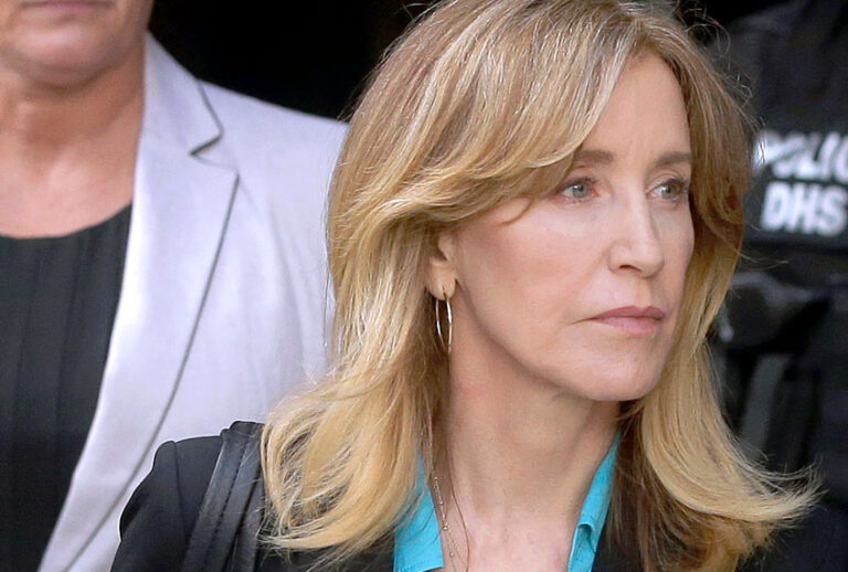 Actress Felicity Huffman arrives at federal court in Boston to face charges in a nationwide college admissions bribery scandal, April 3, 2019. (AP/Steven Senne)
