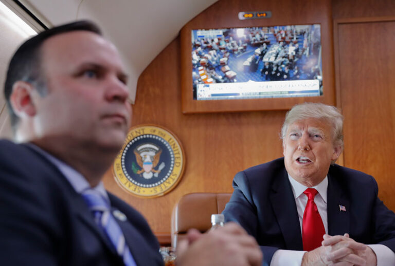 Director of Social Media Dan Scavino and President Donald Trump on board Air Force One. (AP/Pablo Martinez Monsivais)