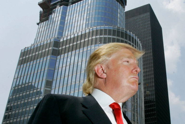 Donald Trump is profiled against his Trump International Hotel & Tower in Chicago. (AP/Charles Rex Arbogast)