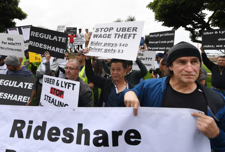 Rideshare drivers for Uber and Lyft stage a strike and protest at the LAX International Airport, over what they say are unfair wages in Los Angeles, California on May 8, 2019. (Getty/Mark Ralston)