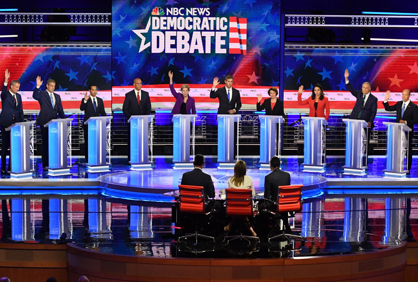 Democratic presidential hopefuls New York City Mayor Bill de Blasio, Rep. Tim Ryan (D-OH), former US Secretary of Housing and Urban Development Julian Castro, Sen. Cory Booker (D-NJ), Sen. Elizabeth Warren (D-MA), former Texas Rep. Beto O'Rourke, Sen. Amy Klobuchar (D-MN), Rep. Tulsi Gabbard (D-HI), Washington Governor Jay Inslee and former Maryland Rep. John Delaney participate in the first Democratic primary debate of the 2020 presidential campaign season in Miami, Florida, June 26, 2019. (Getty/)