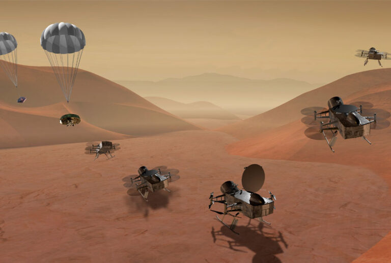 This artist's rendering made available by NASA shows multiple views of the Dragonfly dual-quadcopter lander that would take advantage of the atmosphere on Saturn's moon Titan to explore multiple locations, some hundreds of miles apart. (NASA via AP)