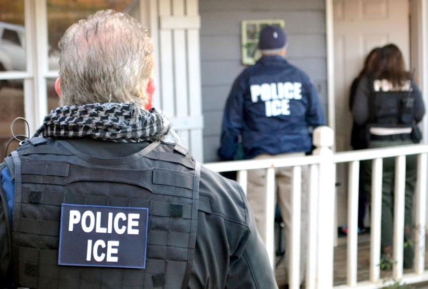 (Bryan Cox/ICE via AP)