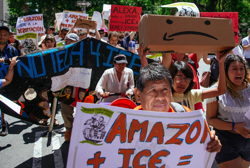 Protestors march to a building where Amazon owner Jeff Bezos owns property on July 15, 2019 in New York City. (Getty/Kevin Hagen)