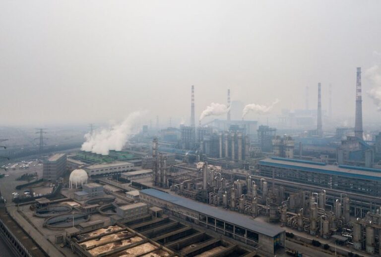 This aerial view taken on February 17, 2018 with a drone shows pollution being emitted from steel factories in Hancheng, Shaanxi province. / AFP PHOTO / FRED DUFOUR        (Photo credit should read FRED DUFOUR/AFP/Getty Images) (Fred Dufour/Afp/Getty Images)