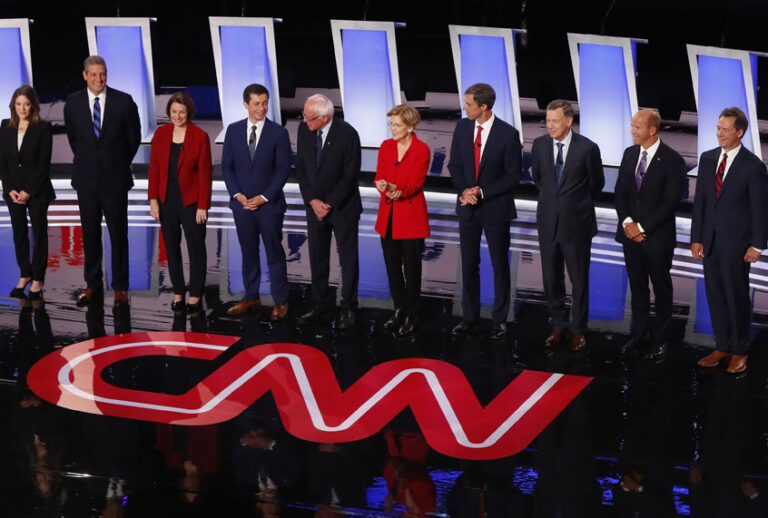 Marianne Williamson, Rep. Tim Ryan (D-OH), Sen. Amy Klobuchar (D-MN), South Bend Mayor Pete Buttigieg, Sen. Bernie Sanders (I-VT), Sen. Elizabeth Warren (D-MA), former Texas Rep. Beto O'Rourke, former Colorado Gov. John Hickenlooper, former Maryland Rep. John Delaney and Montana Gov. Steve Bullock take the stage for the first of two Democratic presidential primary debates hosted by CNN Tuesday, July 30, 2019, in the Fox Theatre in Detroit. (AP/Paul Sancya)