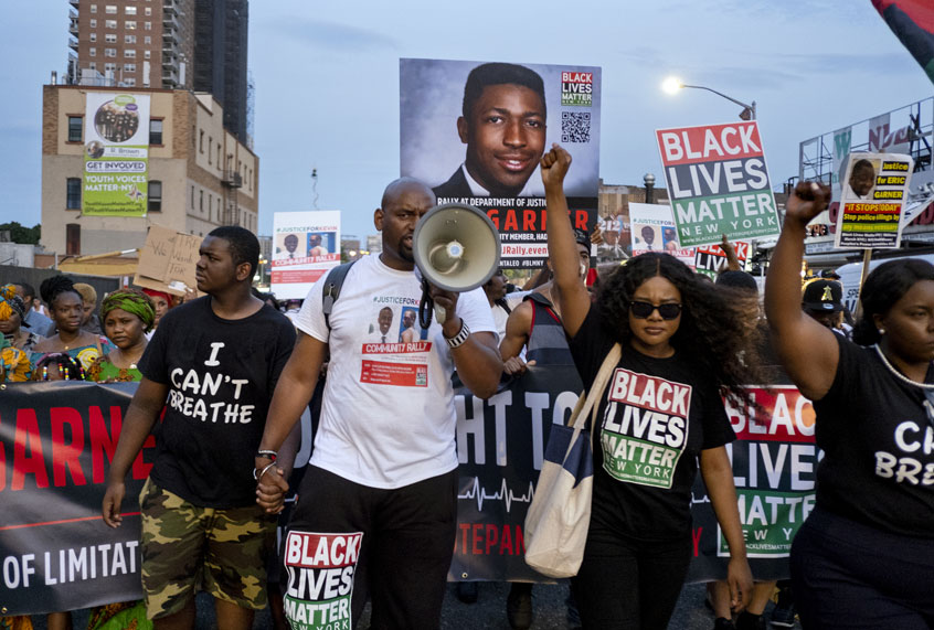 Activists with Black Lives Matter protest in the Harlem neighborhood of New York, Tuesday, July 16, 2019, in the wake of a decision by federal prosecutors who declined to bring civil rights charges against New York City police Officer Daniel Pantaleo, in the 2014 chokehold death of Eric Garner. (AP/Craig Ruttle)