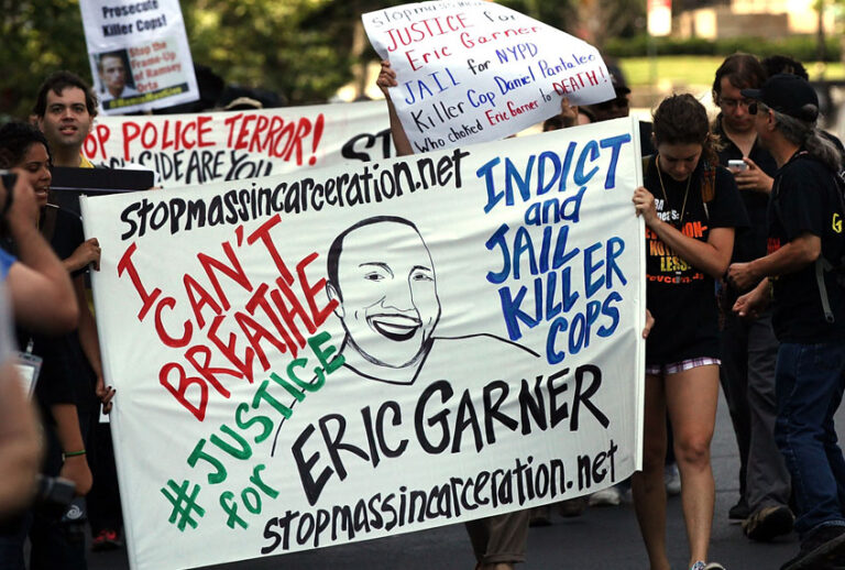 People protest in Staten Island on the one year anniversary of the death of Eric Garner on July 17, 2015 in New York City. (Getty/Spencer Platt)