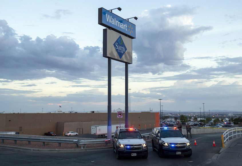 Texas state police cars block the access to the Walmart store in the aftermath of a shooting in El Paso, Tx., Saturday, Aug. 3, 2019. (AP/Andres Leighton)