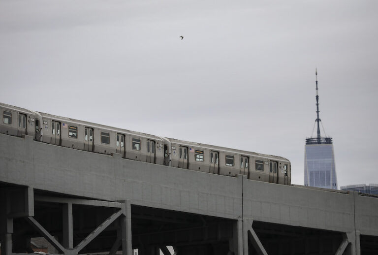 NEW YORK, NY - FEBRUARY 27: With One World Trade Center behind it, a subway train moves along the F/G line in Brooklyn, February 27, 2019 in New York City. (Drew Angerer/Getty Images)