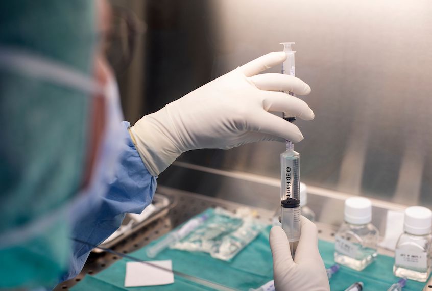 Doctor and pharmacist Gilles Leboucher prepares a diluted solution of phages from three different concentrated types of phages on March 8, 2019, at the Croix-Rousse hospital, in Lyon, central-eastern France. (Romain Lafabregue/AFP/Getty Images)