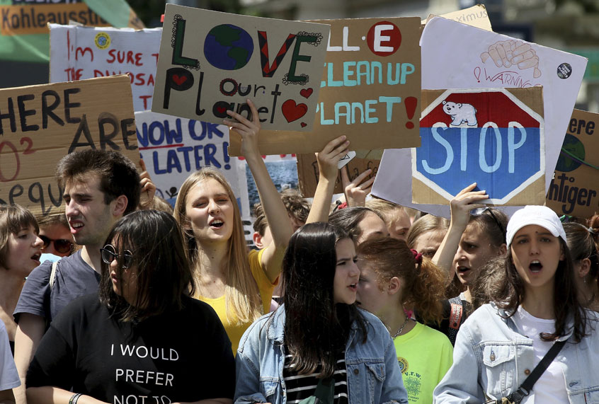 Protesters hold a banner during school strike demonstration Fridays for future in Vienna, Austria, Friday, May 31, 2019. (AP/Ronald Zak)