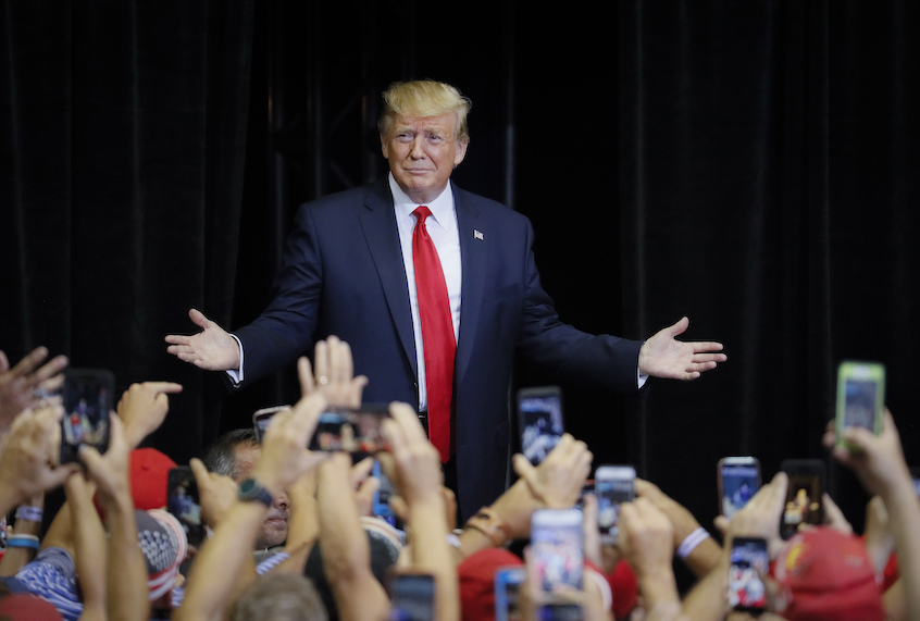 President Donald Trump arrives at a campaign rally at U.S. Bank Arena, Thursday, Aug. 1, 2019, in Cincinnati. (AP Photo/John Minchillo) (AP Photo/John Minchillo)